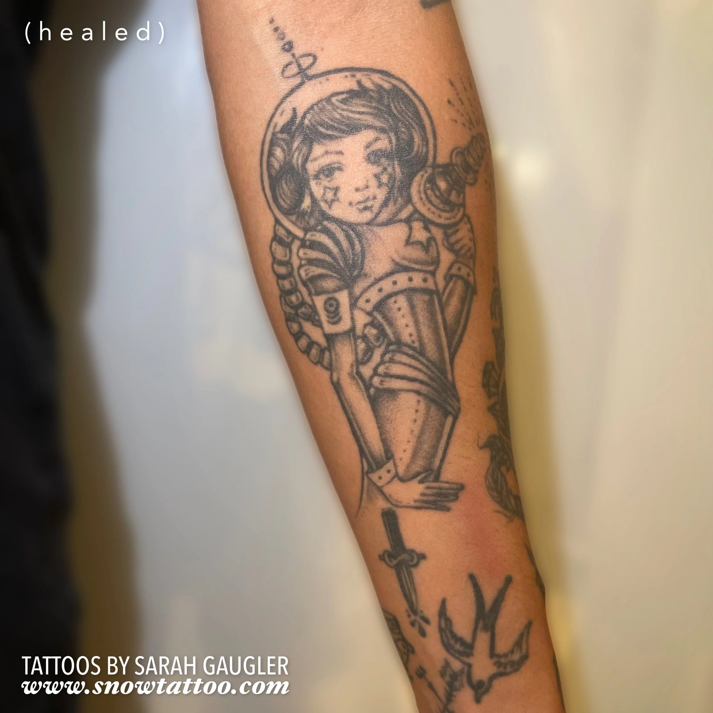 Healed Custom Design Space Girl Fine Line Tattoo Healed after 15 Years