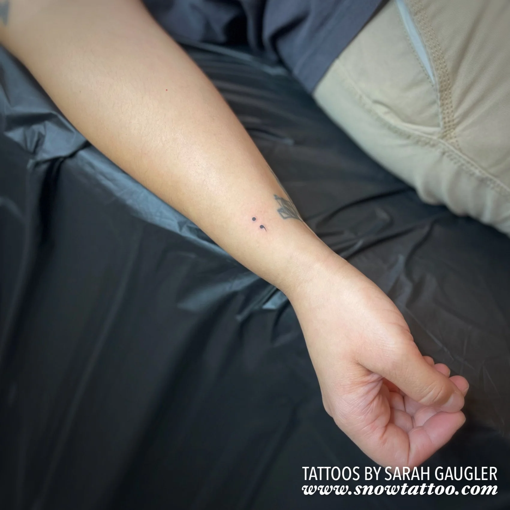 Dainty, Elegant, Mini Semicolon Tattoo by Sarah Gaugler at Snow Tattoo, Tribeca, New York