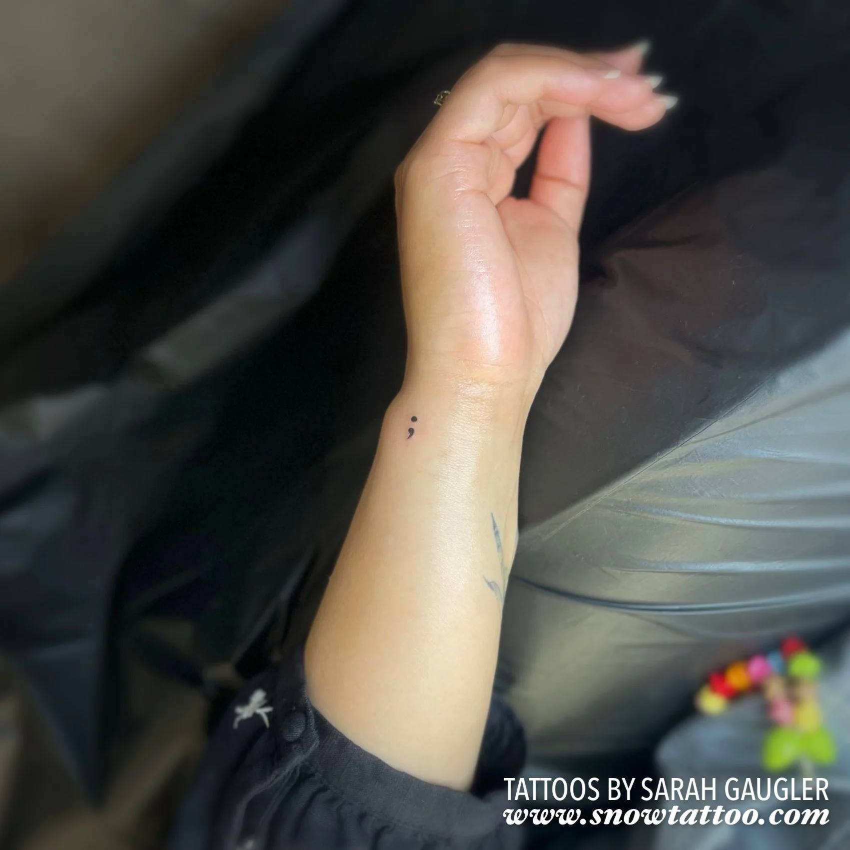 Dainty, Elegant, Mini Semicolon Tattoo by Sarah Gaugler at Snow Tattoo, Tribeca, New York