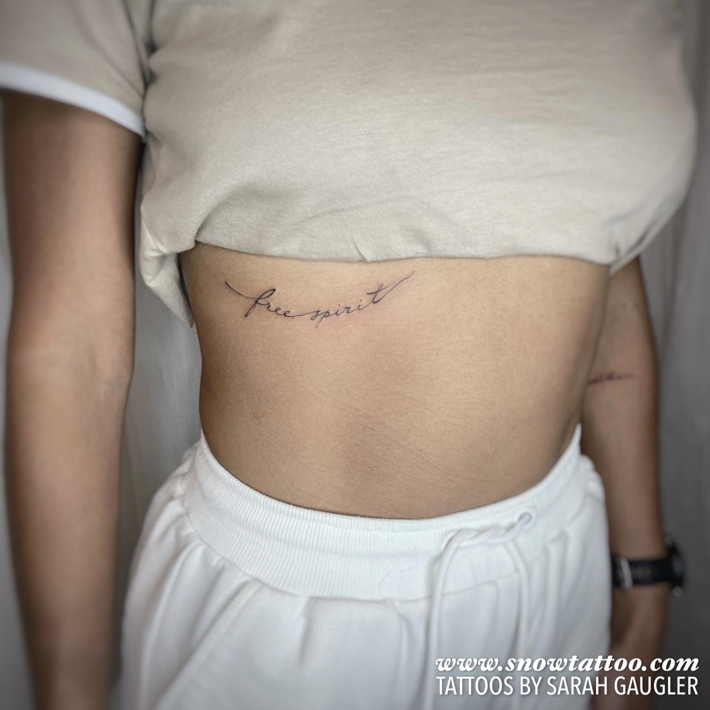 Free Spirit Fine Line Custom Script Tattoo by Sarah Gaugler at Snow Tattoo, Tribeca New York