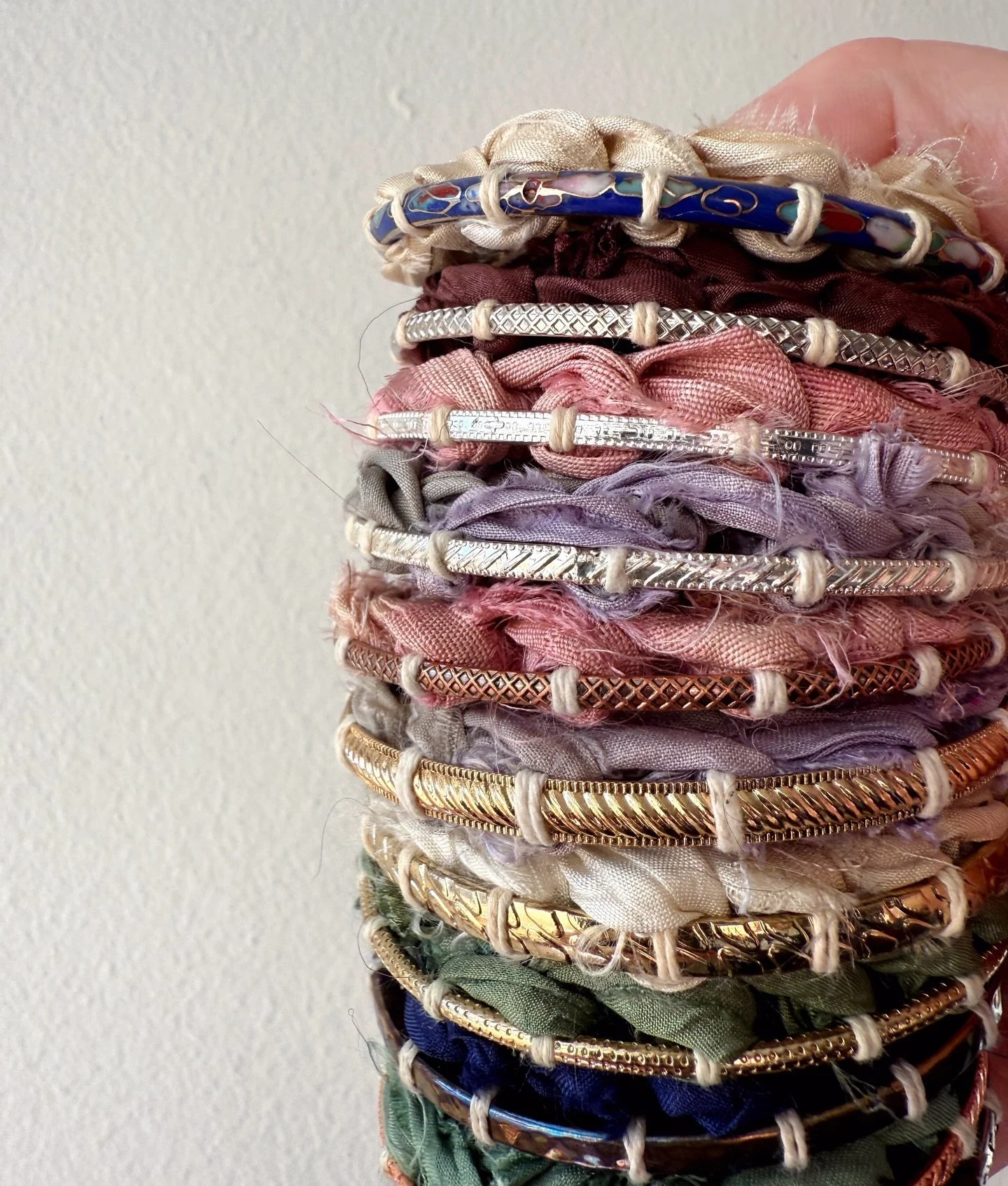 The (remaining) 2025 Lionheart Canyon Studio heirloom ornament collection is now available online! Each one is handwoven with ethically sourced sari silk, on a vintage textured hoop (bracelets found in my childhood bedroom &mdash; can you imagine the