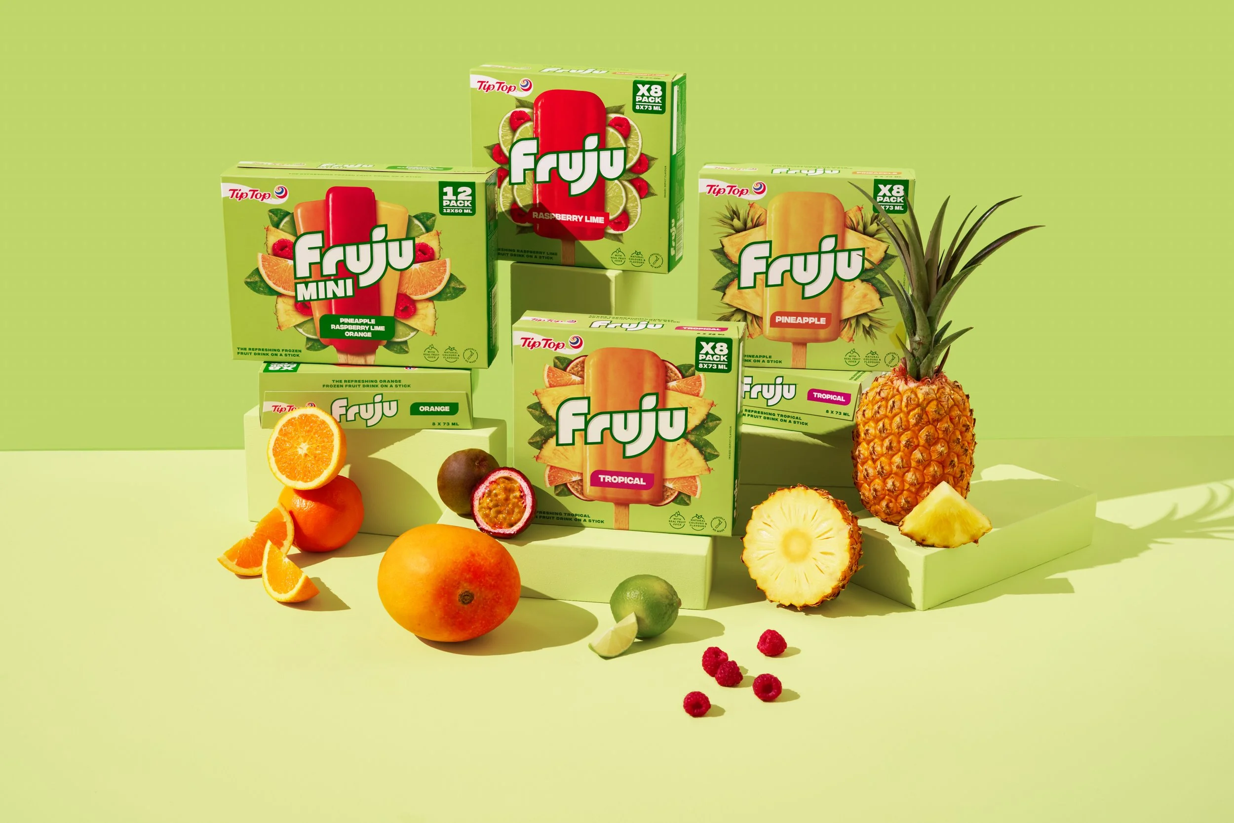 Tip Top Fruju Packaging - Green background and packaging for the Fruju range freaturing fresh produce by photographer Victoria Baldwin
