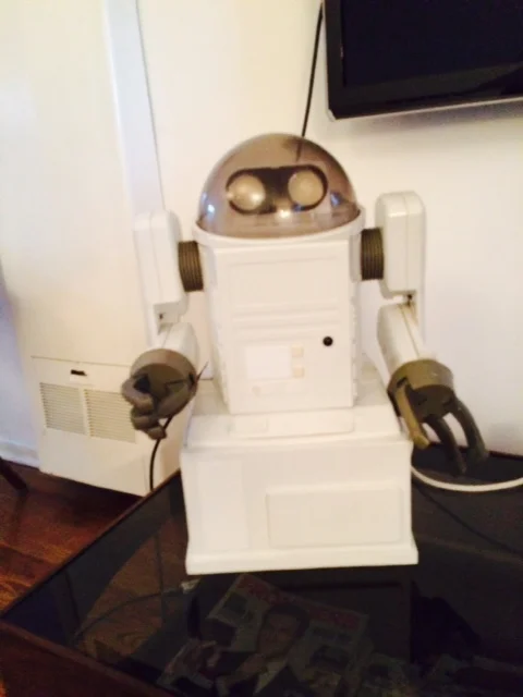 The robot who cleans and does odd jobs in Space Station 76. Now safely earthbound in Jack's apartment.