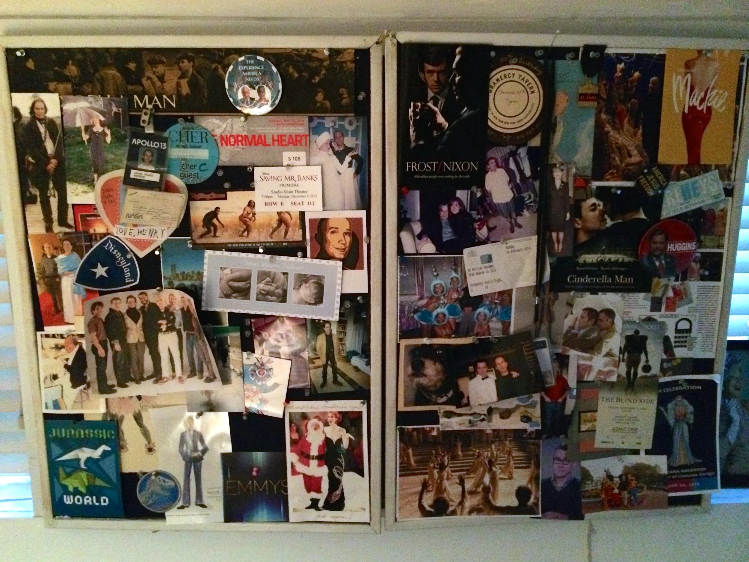 The bulletin board in Daniel's home office with all kinds of fun stuff on it.
