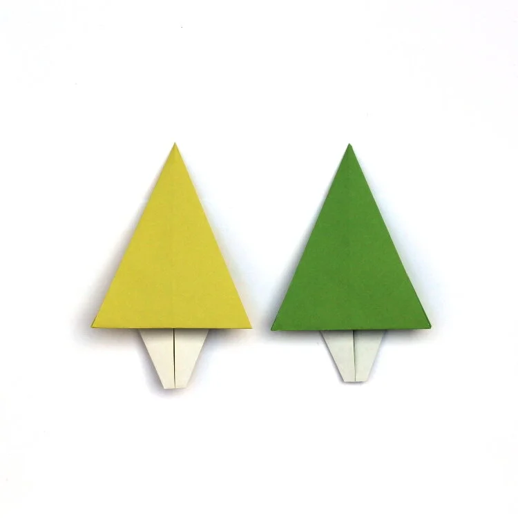two green origami christmas trees