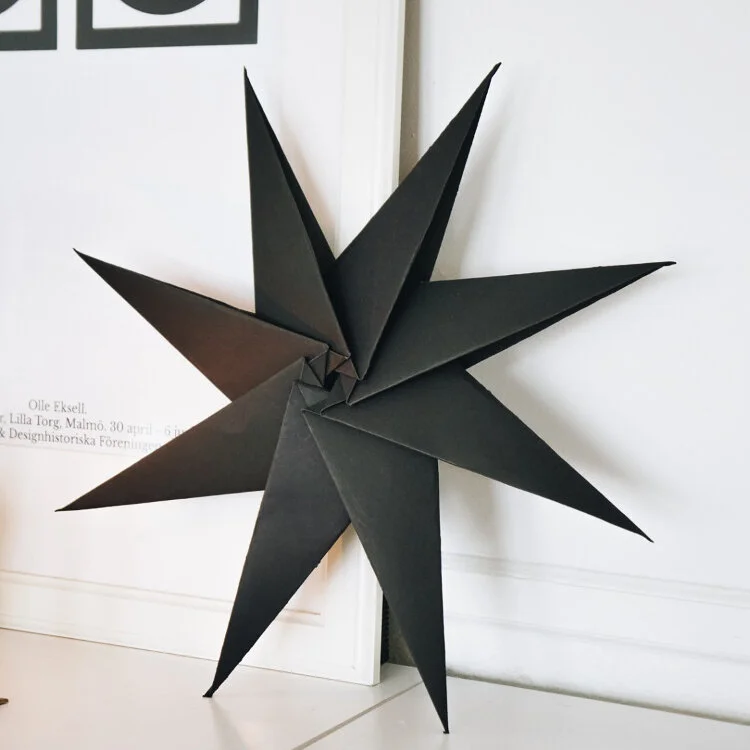 black 8 point origami star