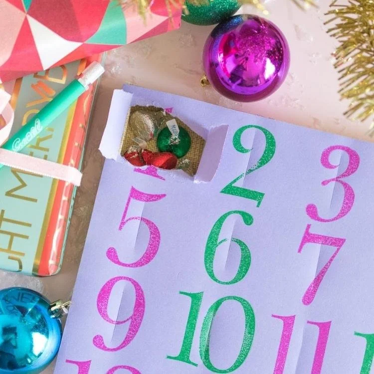 lilac paper box with hole ripped in the top left