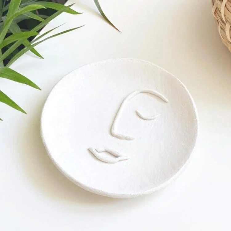 air dry clay face on catch all jewellery bowl