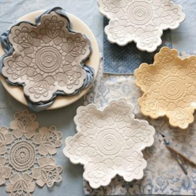 doily patterned clay bowls