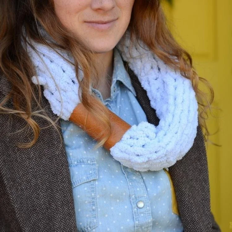 white knitted cowl with leather cuff