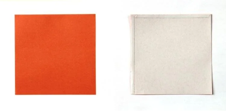 orange square paper with double-sided tape on the back