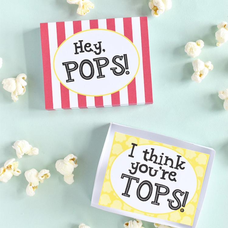 Gift boxes with popcorn puns on.