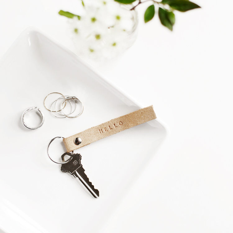 Leather keyring attached to key.