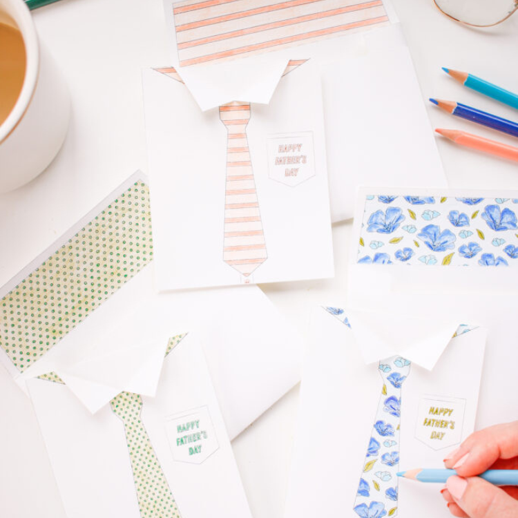 Shirt and tie cards being coloured in.