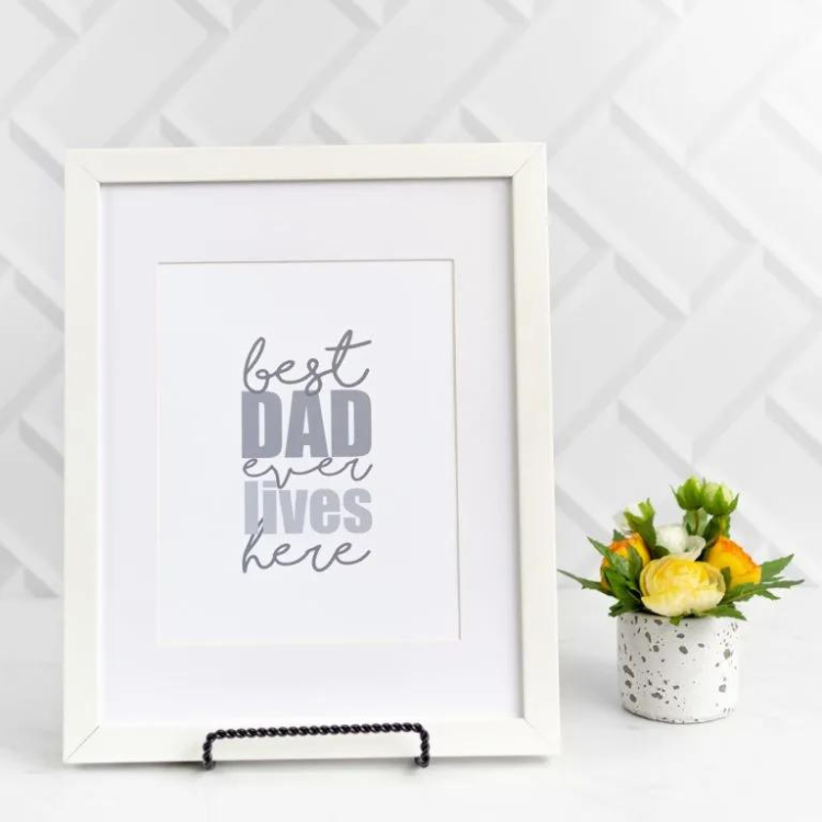 Print in frame with the words best dad ever lives here.
