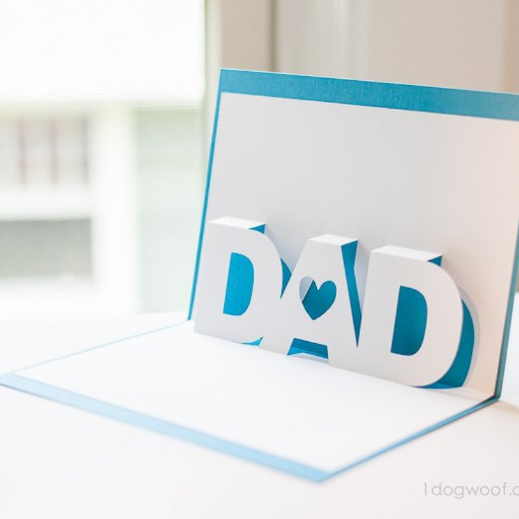 White card with pop up 'DAD'.