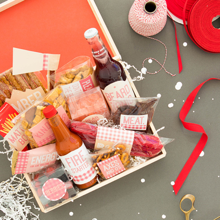 Wooden basket containing food and drink wrapped in printable labels.