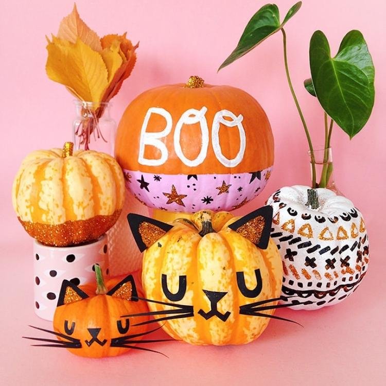 Decorated cat pumpkins.