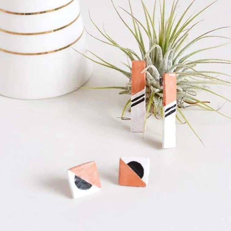 Black white and terracotta square earrings.
