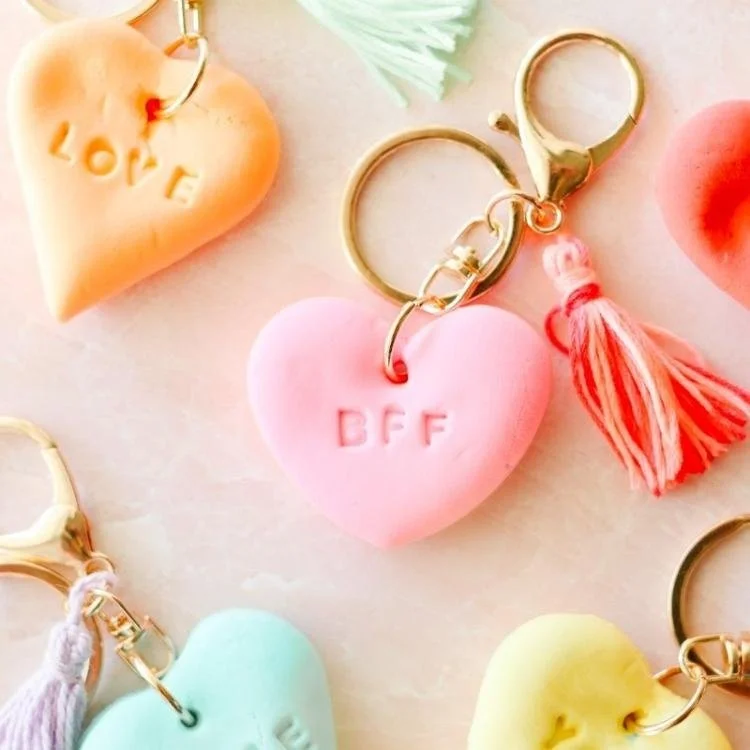 Pastel pink air dry clay heart on keychain with tassell.