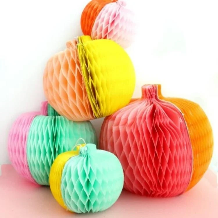 Two tone honeycomb paper pumpkins.