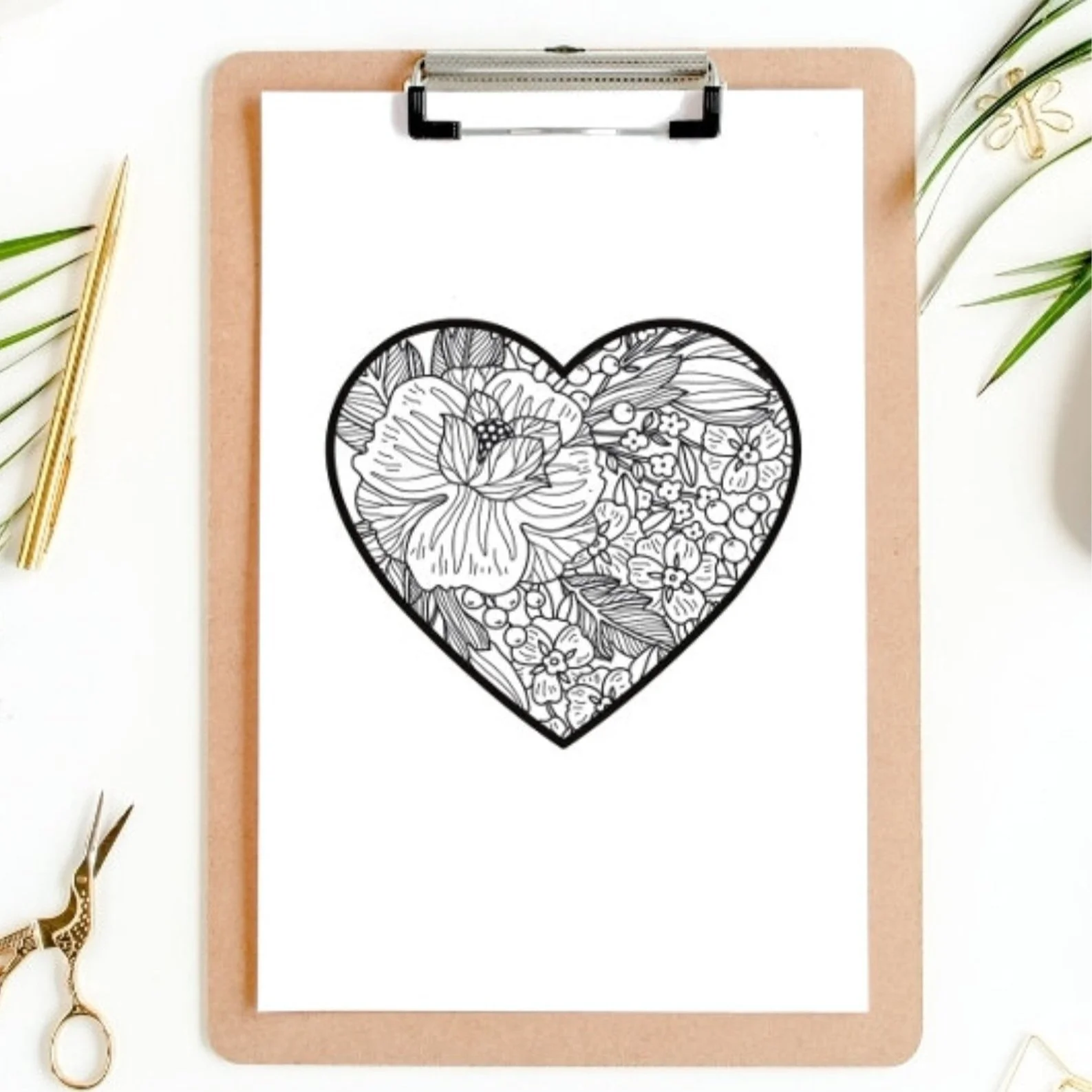 Heart colouring page on clipboard.