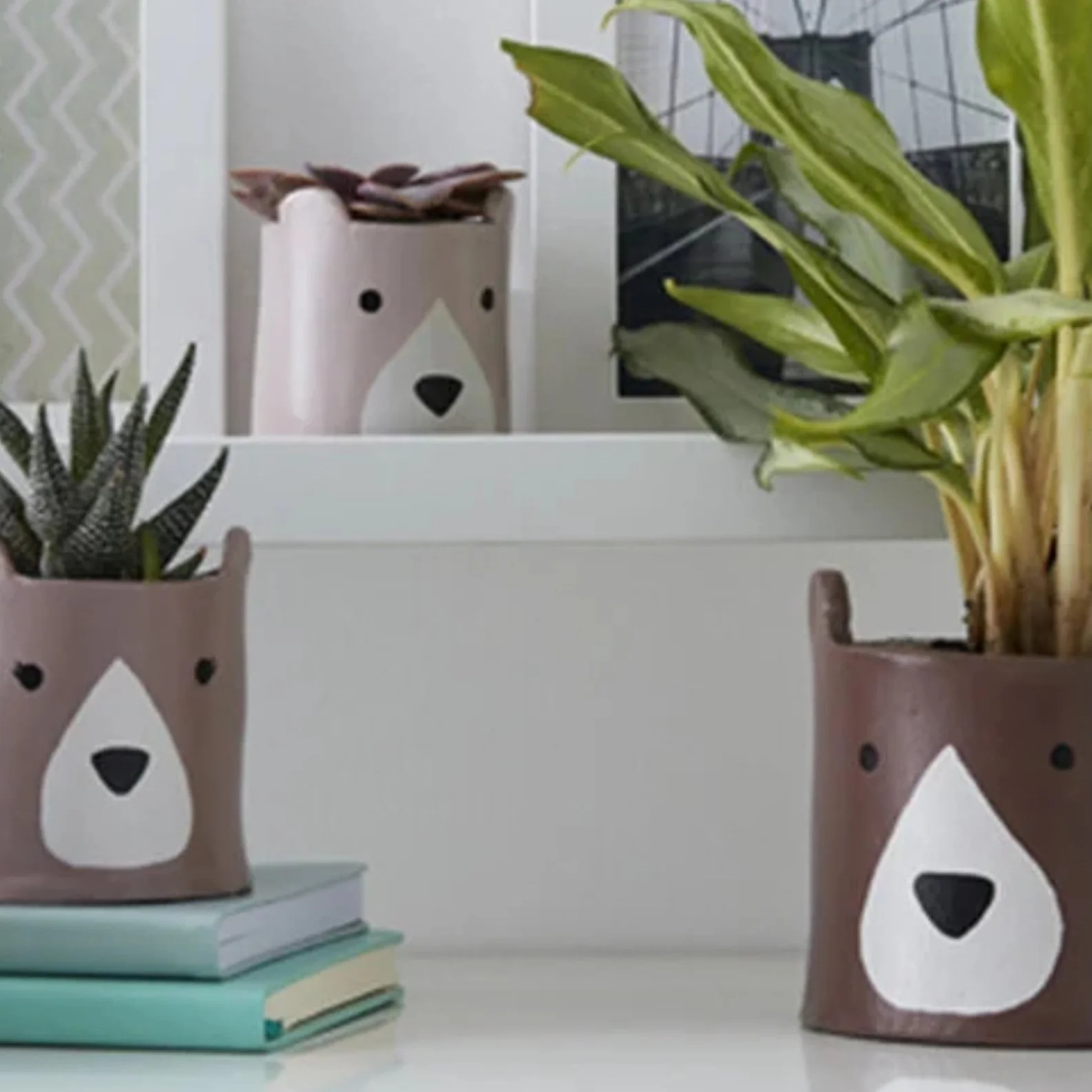 Family Of Clay Bear Planters