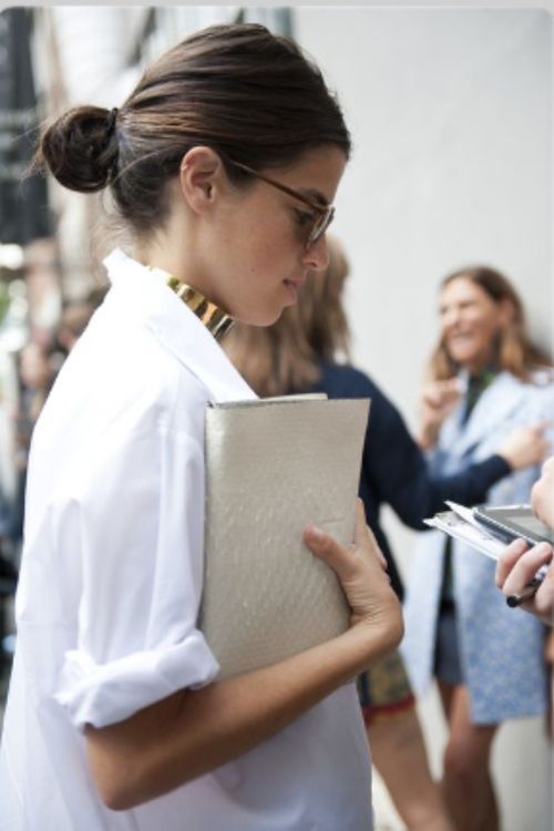 A white shirt is essential to a classic wardrobe whether worn untucked or neatly tucked in. 