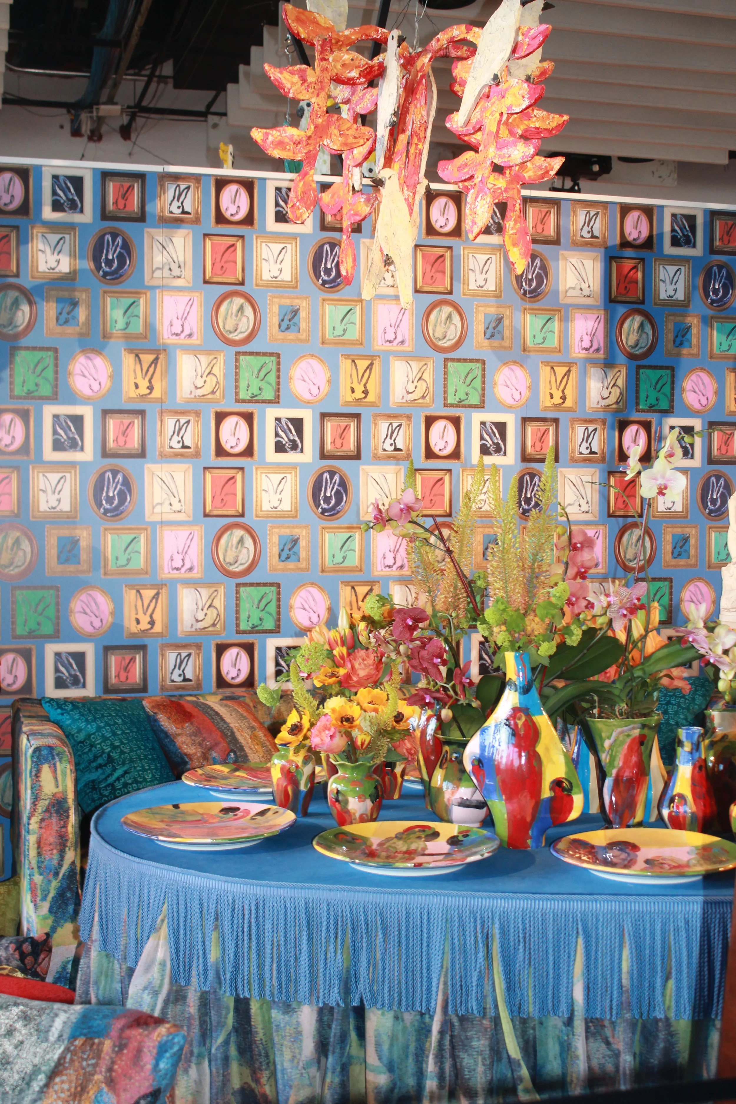 Kravet had two tables this year. This one, bright and happy, brings us from the soft, cool springtime colors to the warmer, bolder colors of the tropics and nature in full bloom in this inviting table setting. Image property of Jessica Gordon Ryan.