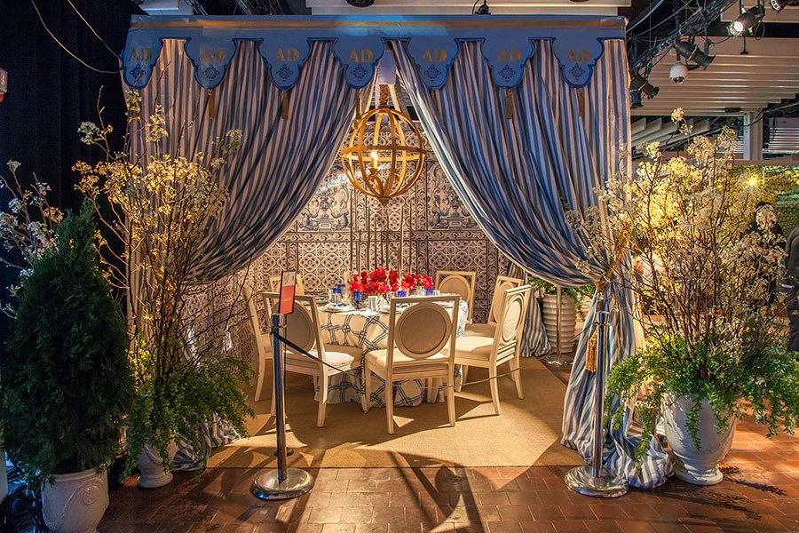 This spectacular table created by the folks at Architectural Digest takes homage to the Château de Groussay which was built in 1815 but underwent an expansion in 1952 that included the addition of several follies on the grounds. The Tartar Tent, constructed in 1960 resembles a 1781 structure at Drottningholm Palace in Sweden. Image via Architectural Digest. 