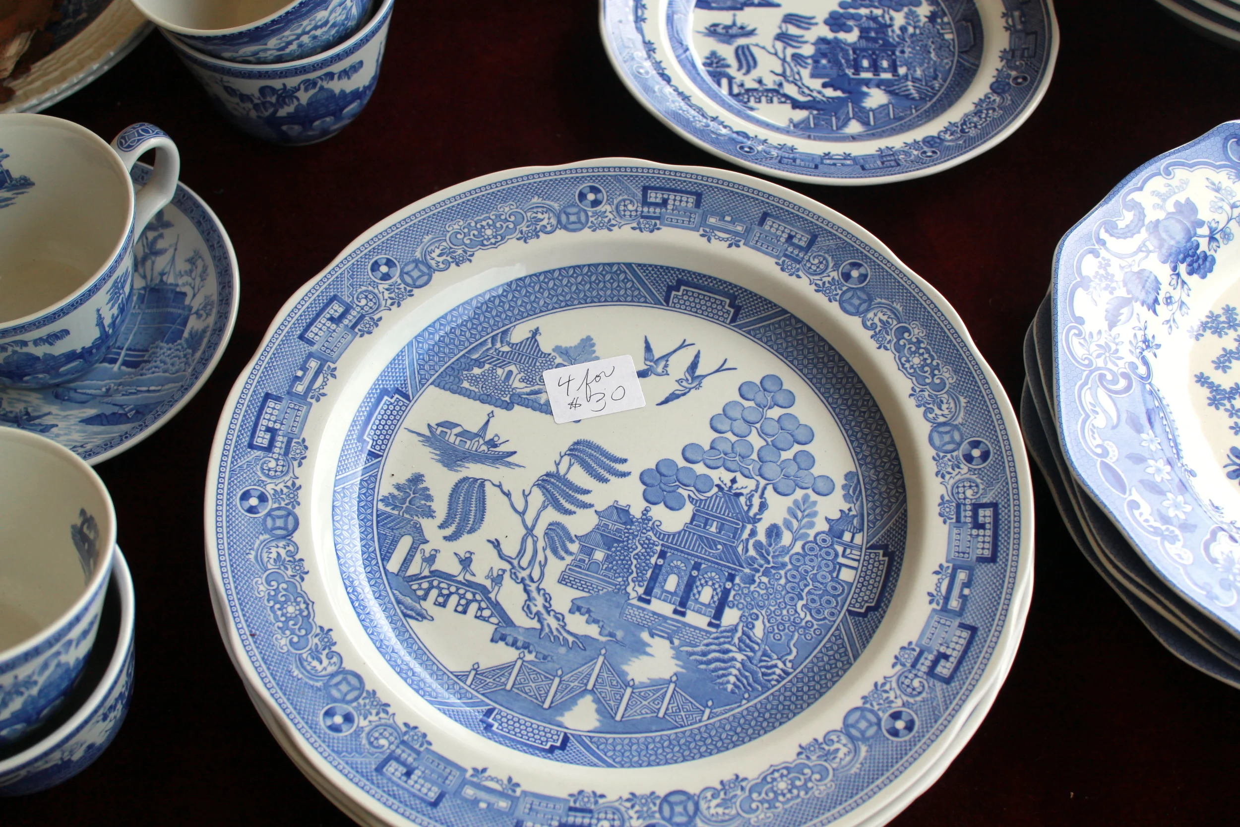 Fill in, add to or enhance your tableware. Antiques shows and flea markets offer great and varied selections at all price points. Can't find a dozen of the same. Consider the art of mix and match! It adds wonderful color and texture to any table setting. 