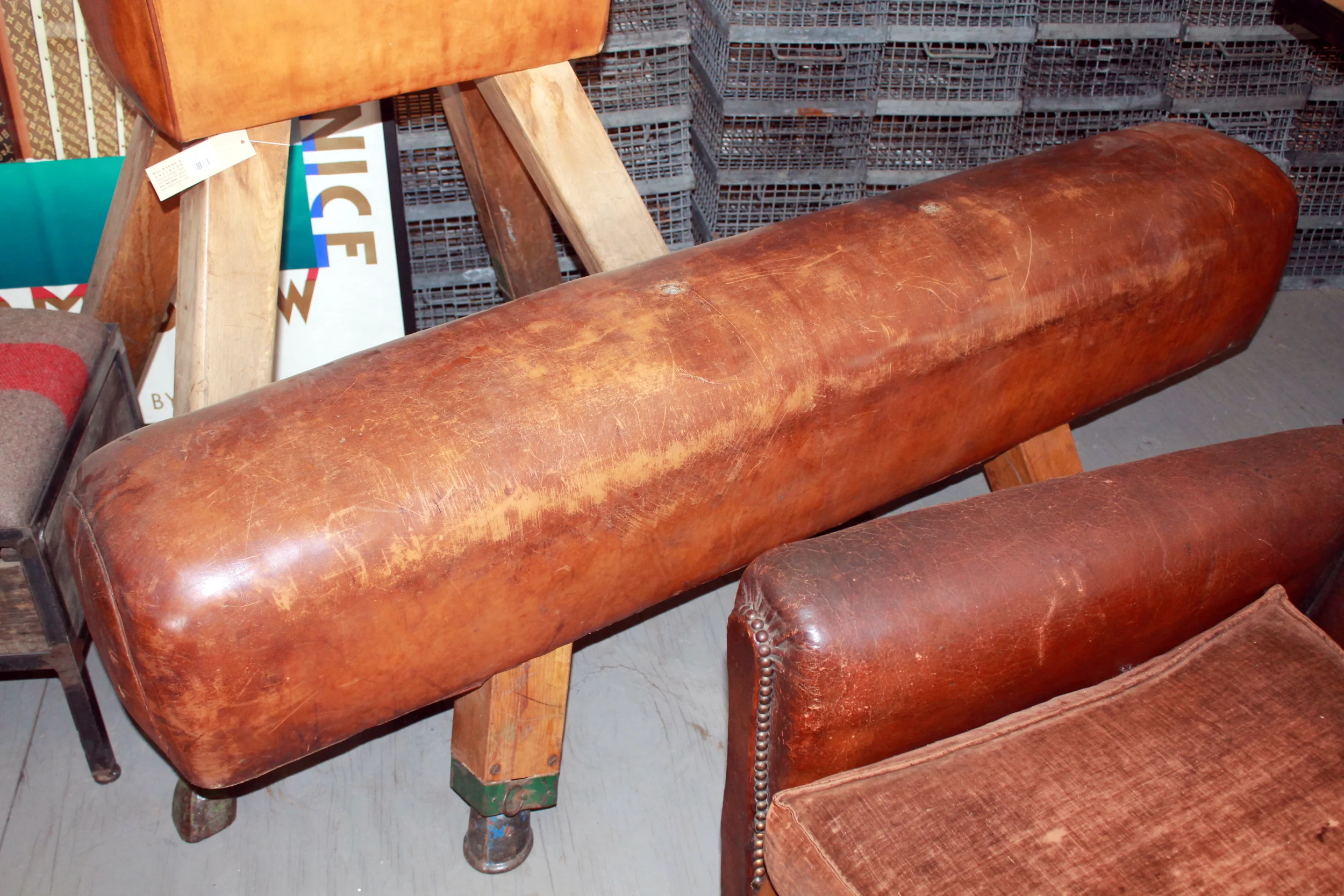 Look to repurpose the unusual. An old pummel horse makes for a perfect bench in a home's entryway or kitchen table. 