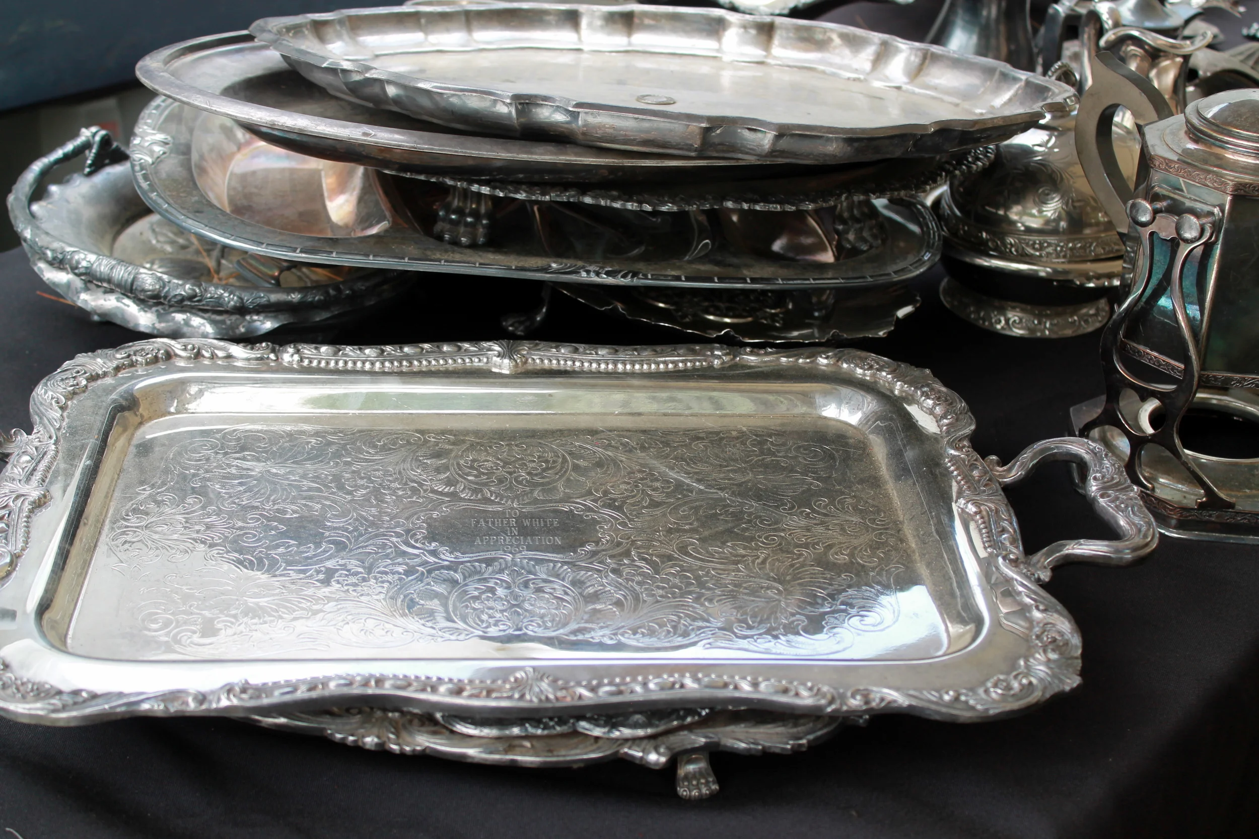 One can never have too many silver trays. In a bedroom or guest room - A perfect platform for a vase filled with flowers, a few bottles of perfume and a candle. If on a budget look for a silver plate tray to dress up any space. 