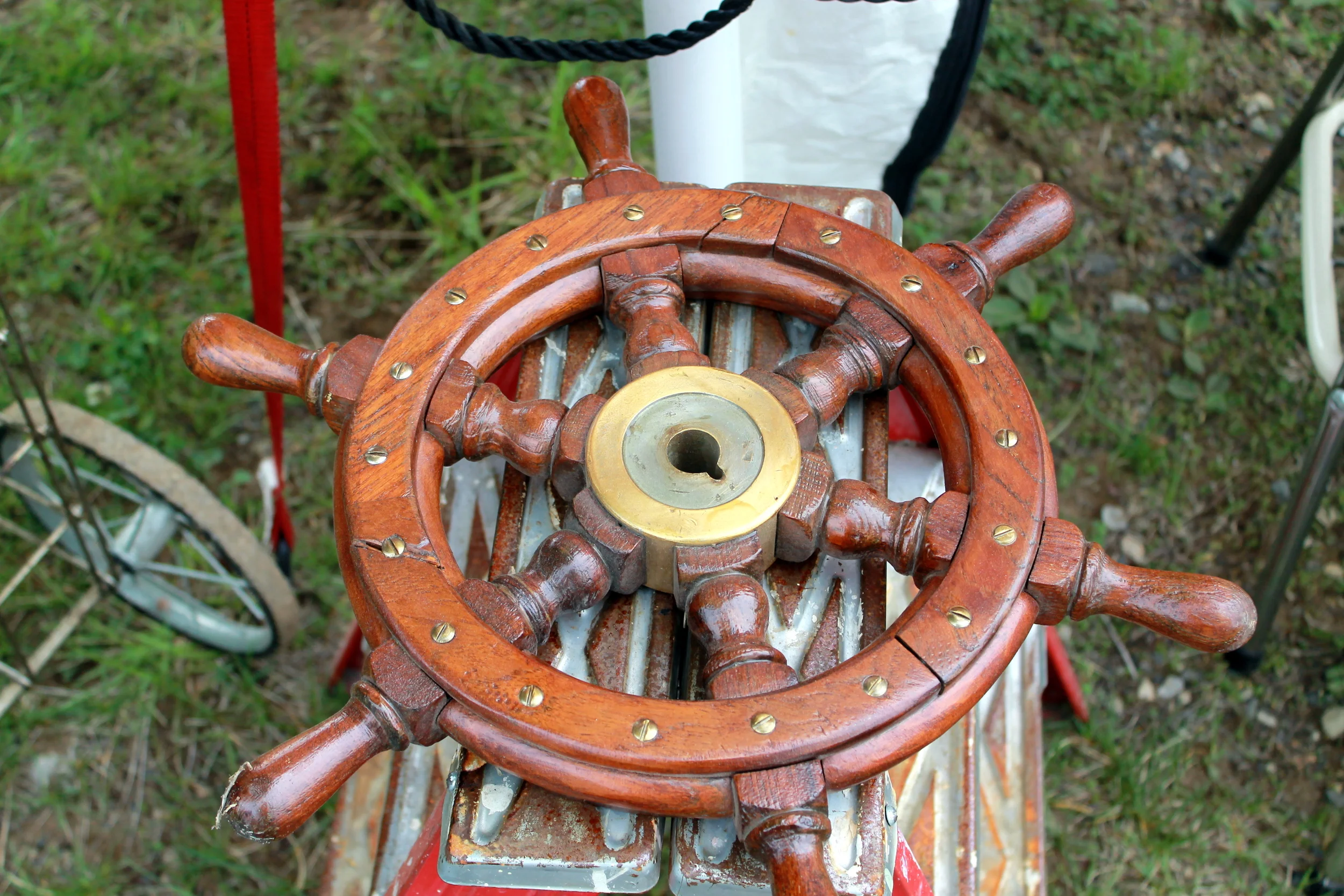 An old ship's wheel adds the perfect nautical touch to a coastal home or a decorative piece in a boy's bedroom.