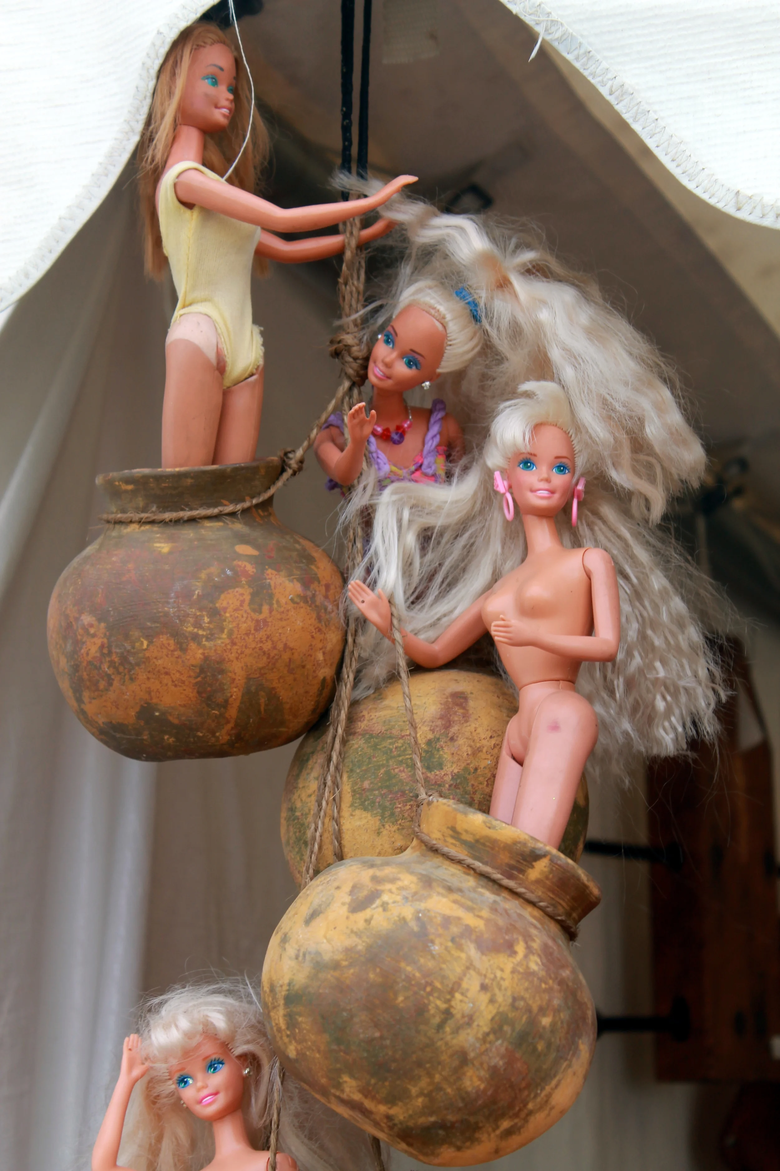 Barbie came in on a wrecking ball... Did Miley Cyrus inspire this strange display. Brimfield Antique show and Flea market