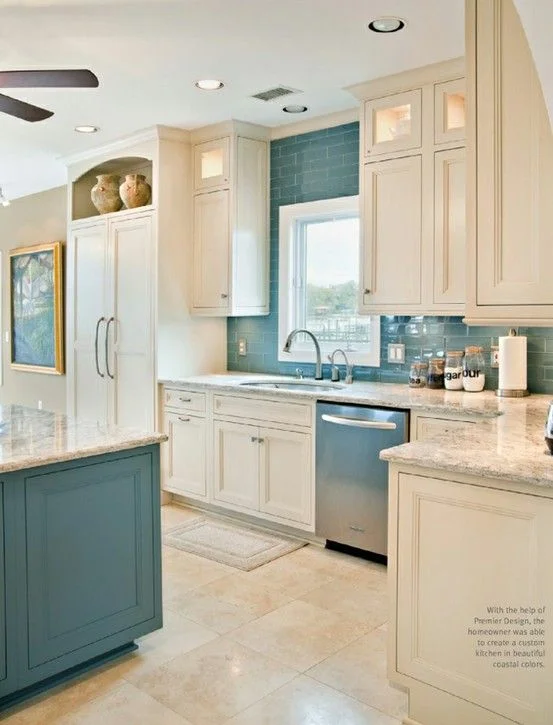 A blue reminiscent of the sea offers a calming effect in a space that is often high energy. Image via Charleston Home + Design Magazine. 