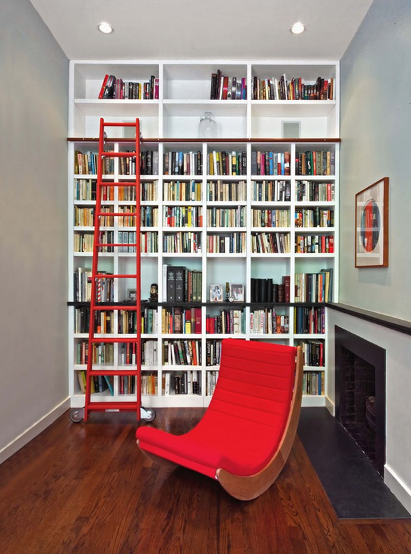 The many uses for the library ladder in the home. Image via Homedit