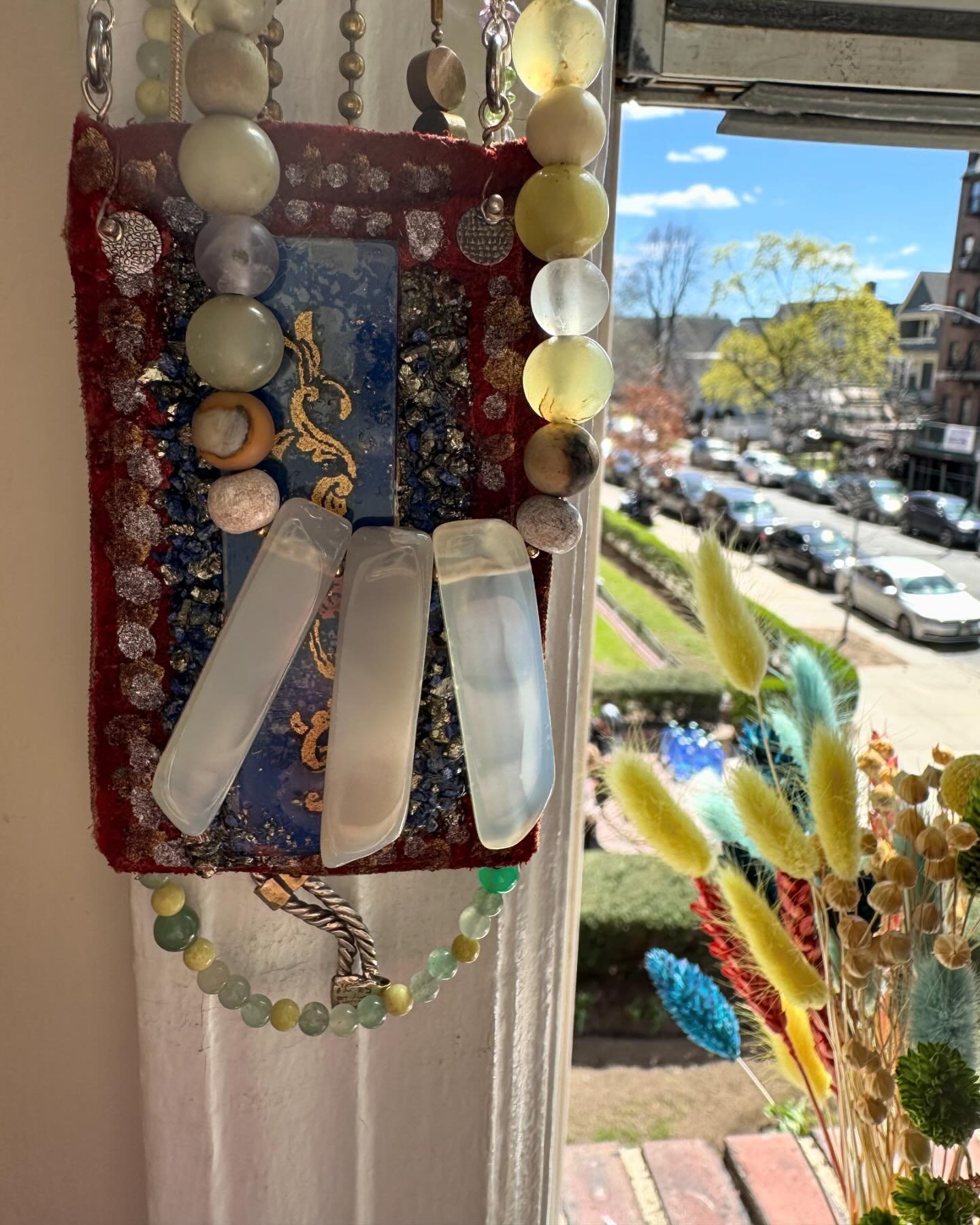 Smatterings of spring with:  eclipse poem from 2019 factory hollow chapbook &ldquo;faux pas&rdquo;, bloodstone &amp; pyrite beaded necklace, piles of jewels, layering, magnolia blossoms, dyed and painted repurposed tee, blue dyed rope, yellow glass, 