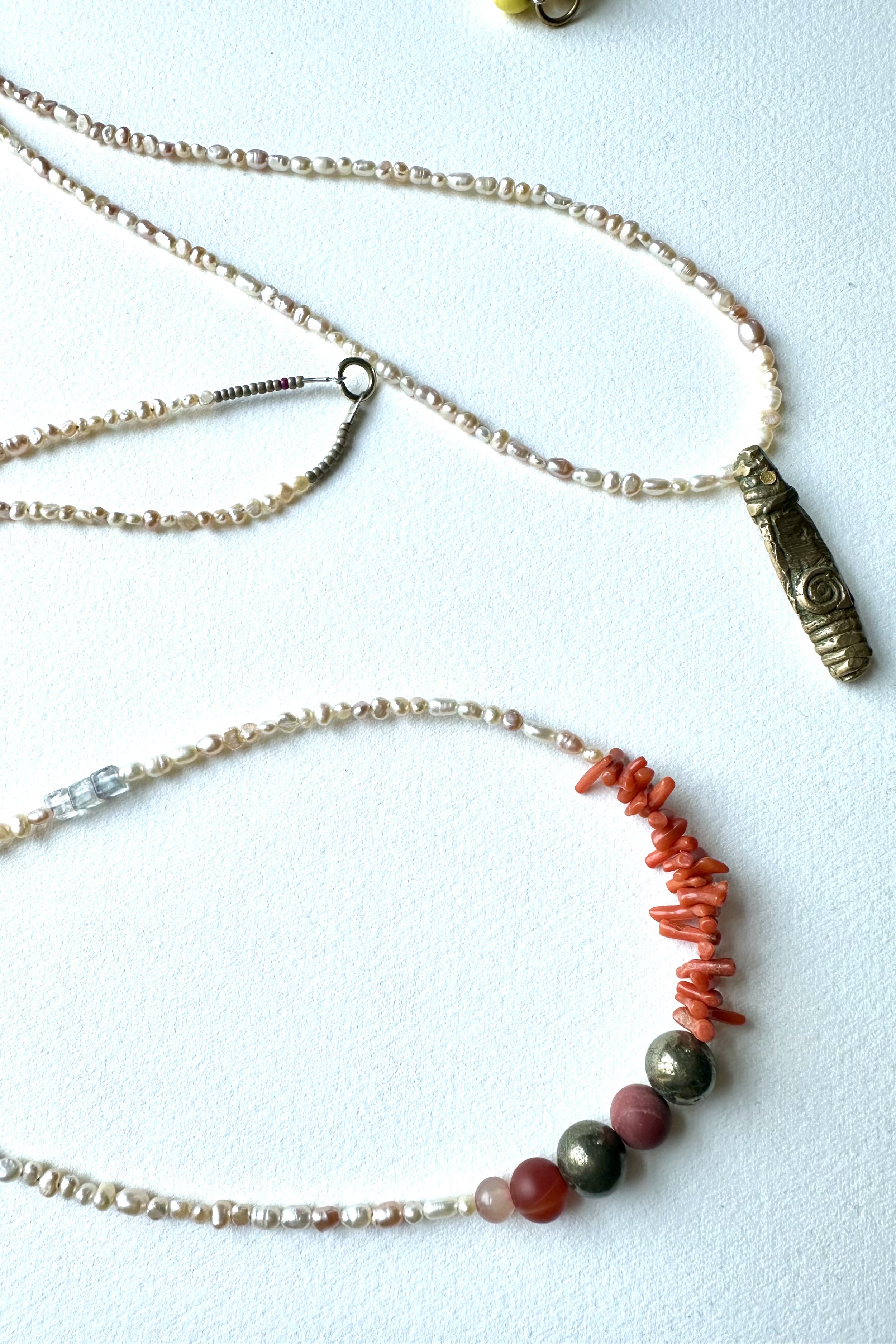 layering freshwater pearl necklaces