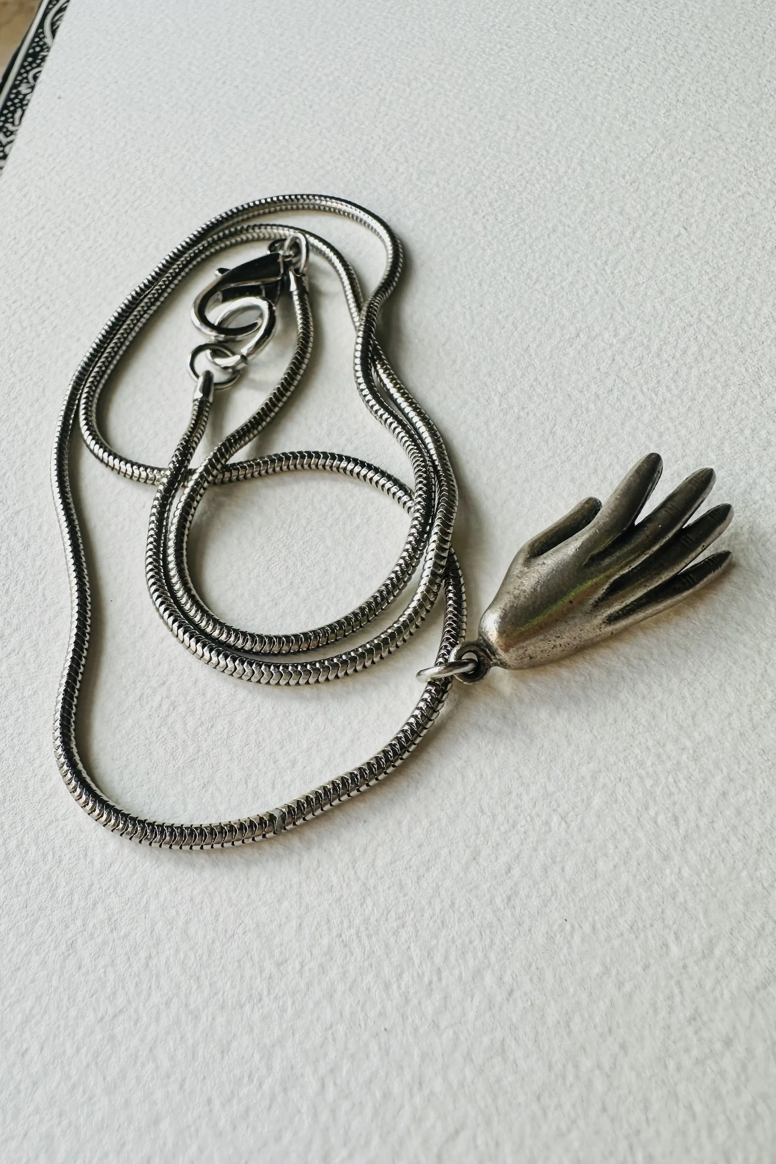 surreal silver hand