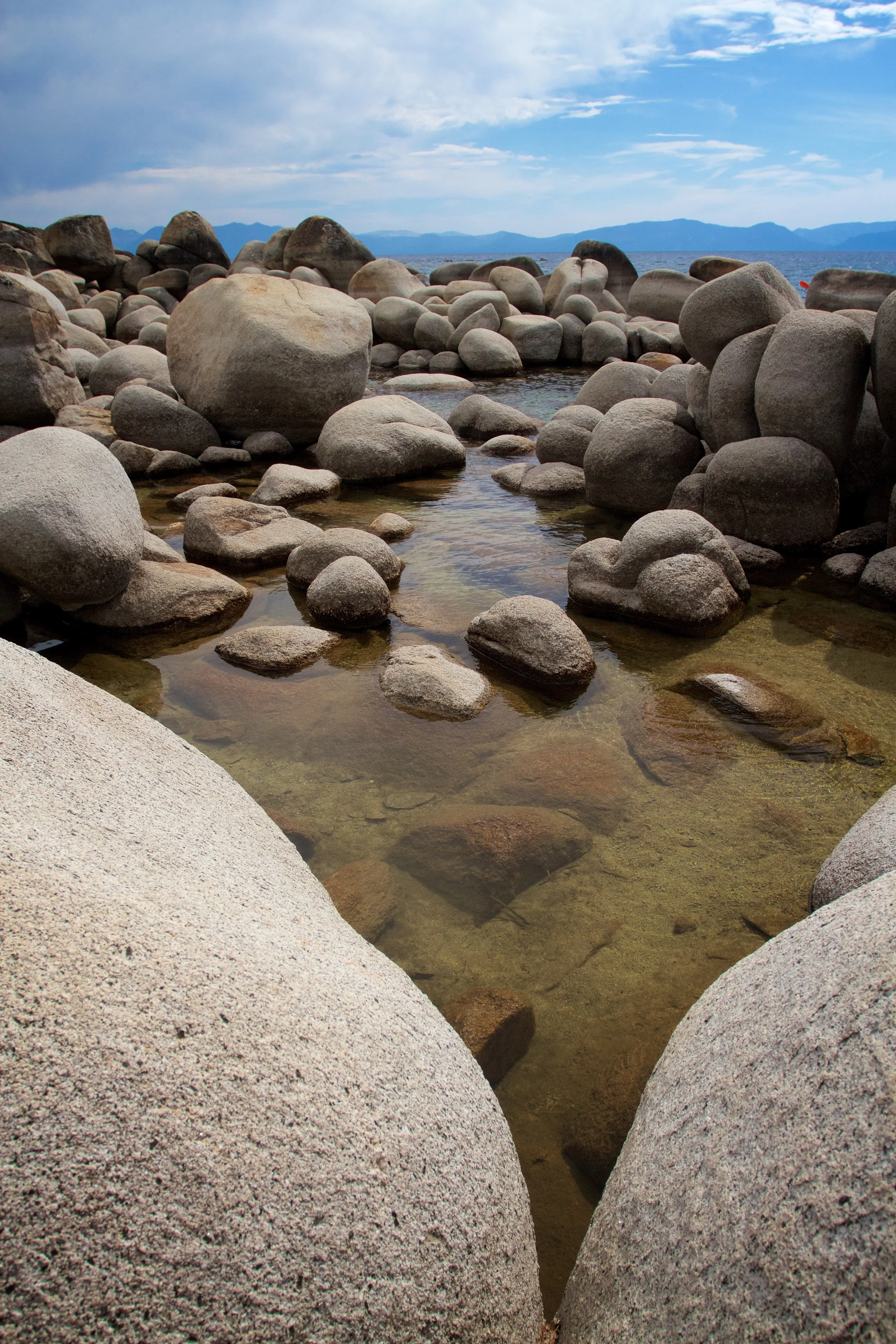 Where the boulders meet the lake is an interesting and gorgeous combination of texture, reflection, and mood