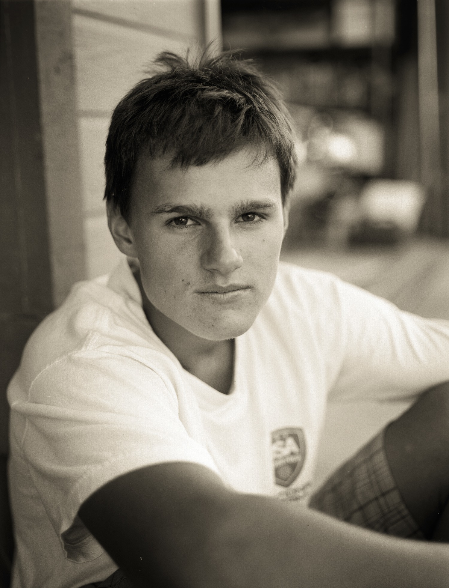 This is hands down one of my favorite portraits I've ever taken. My best friend Nick and I were relaxing in the shade of my garage on a late July afternoon. I had just bought my Bronica a week or so before and was taking quick shots of him during lulls in our conversation. The indirect light combined with the tonality and grain of the film give his skin a metallic and timeless feel.