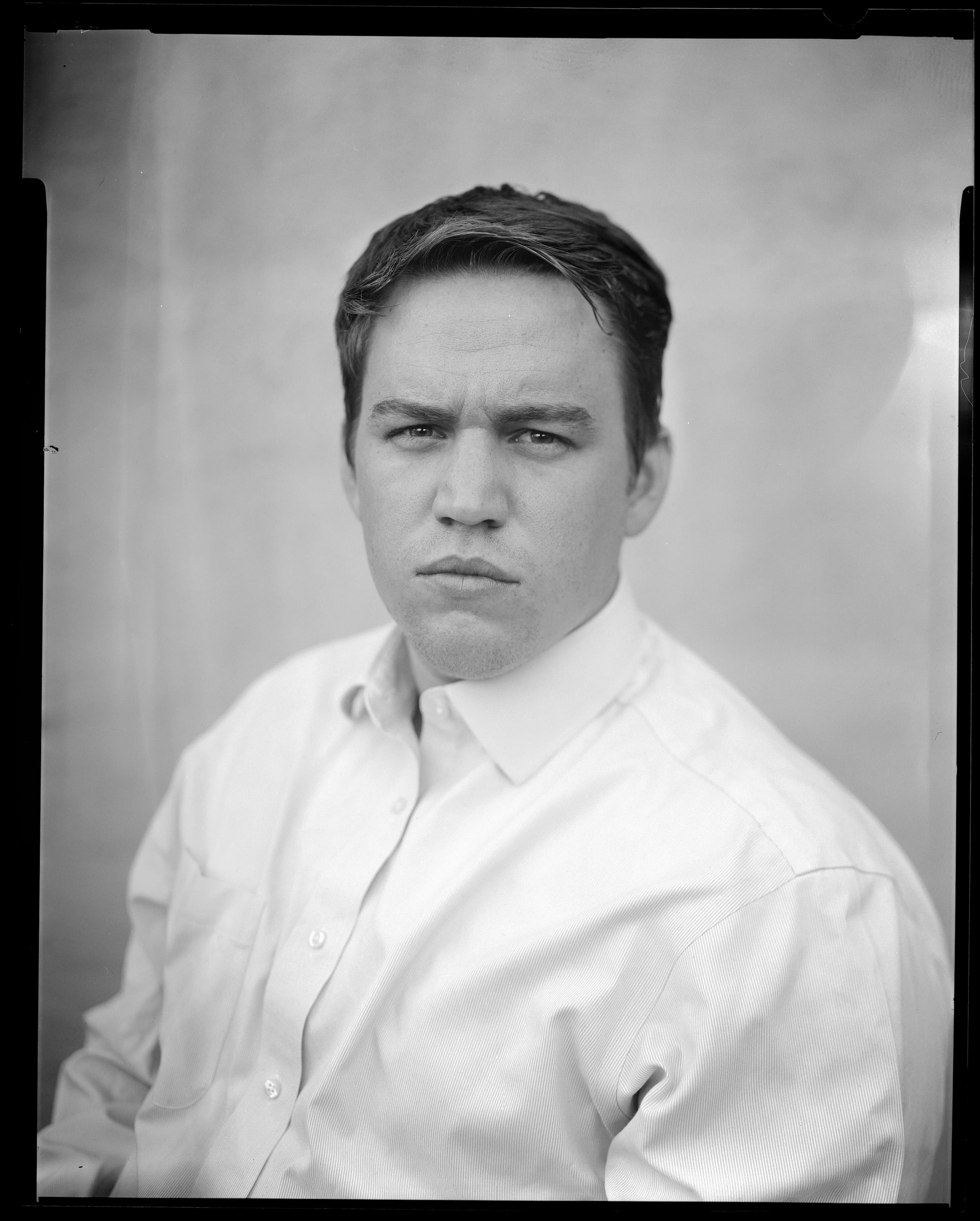4x5 Sheet of my Zach appeasing me again by letting me take his portrait, but this time with my Crown Graphic. Mind the light leaks and partially developed left side as I am still working out my large format workflow.