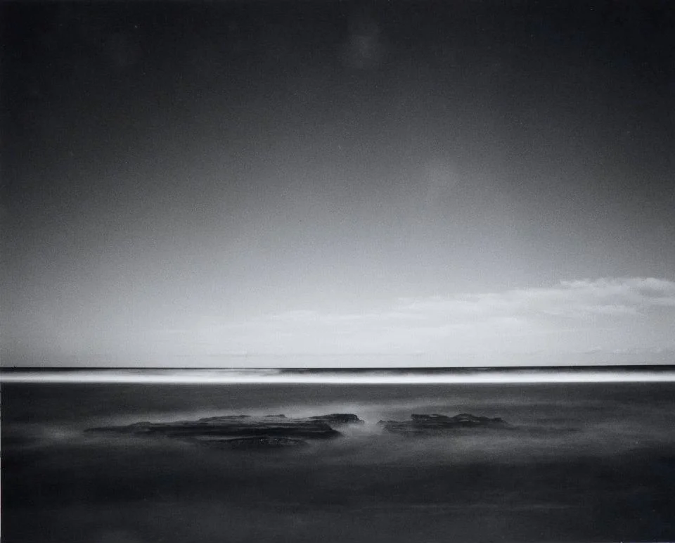 Florida Coast near Flagler Beach, 2012. This was a roughly 2 minute exposure through an assortment of cheap ND's and a deep red filter, a reason why it looks a little soft. Metered exposure was something like ~20 seconds at f/11 but with reciprocity I was very generous with leaving the shutter open.