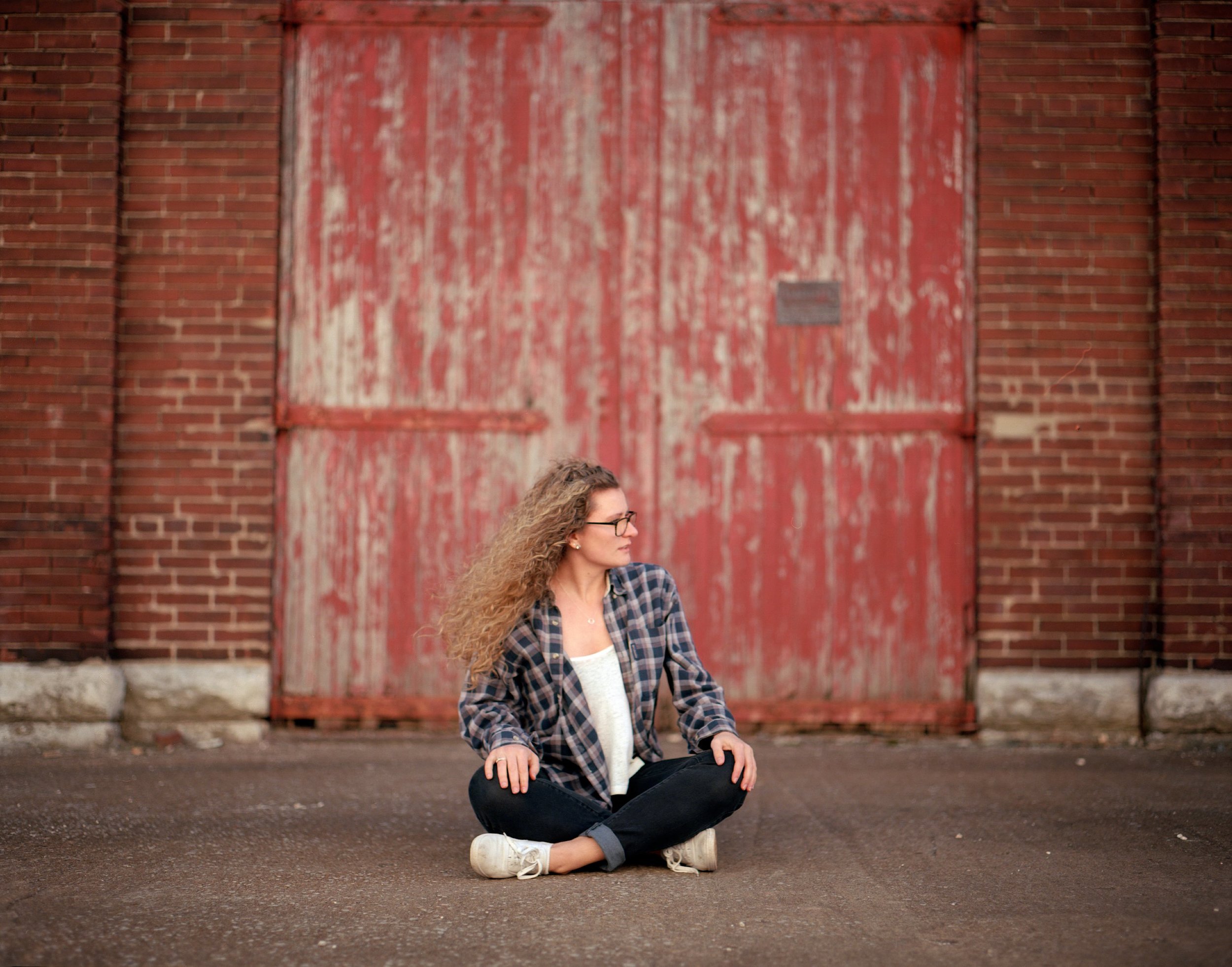 The light was interesting in front of this still used door. The building behind the camera was reflecting the warm afternoon sun but gently back onto Jo.