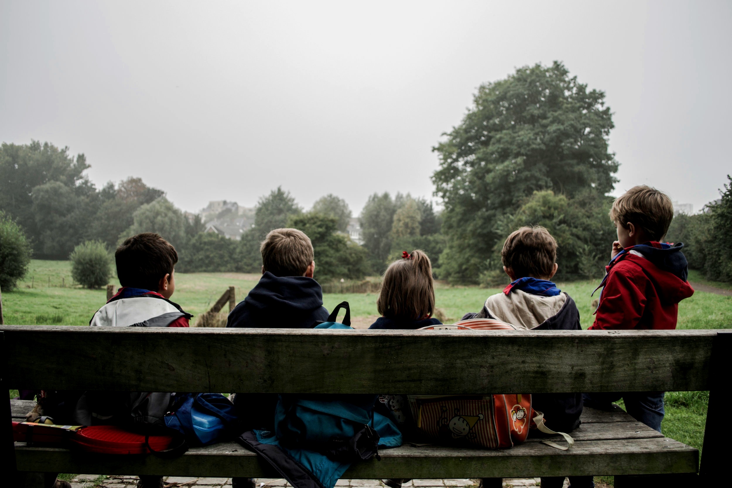 children sitting on a bench.jpg