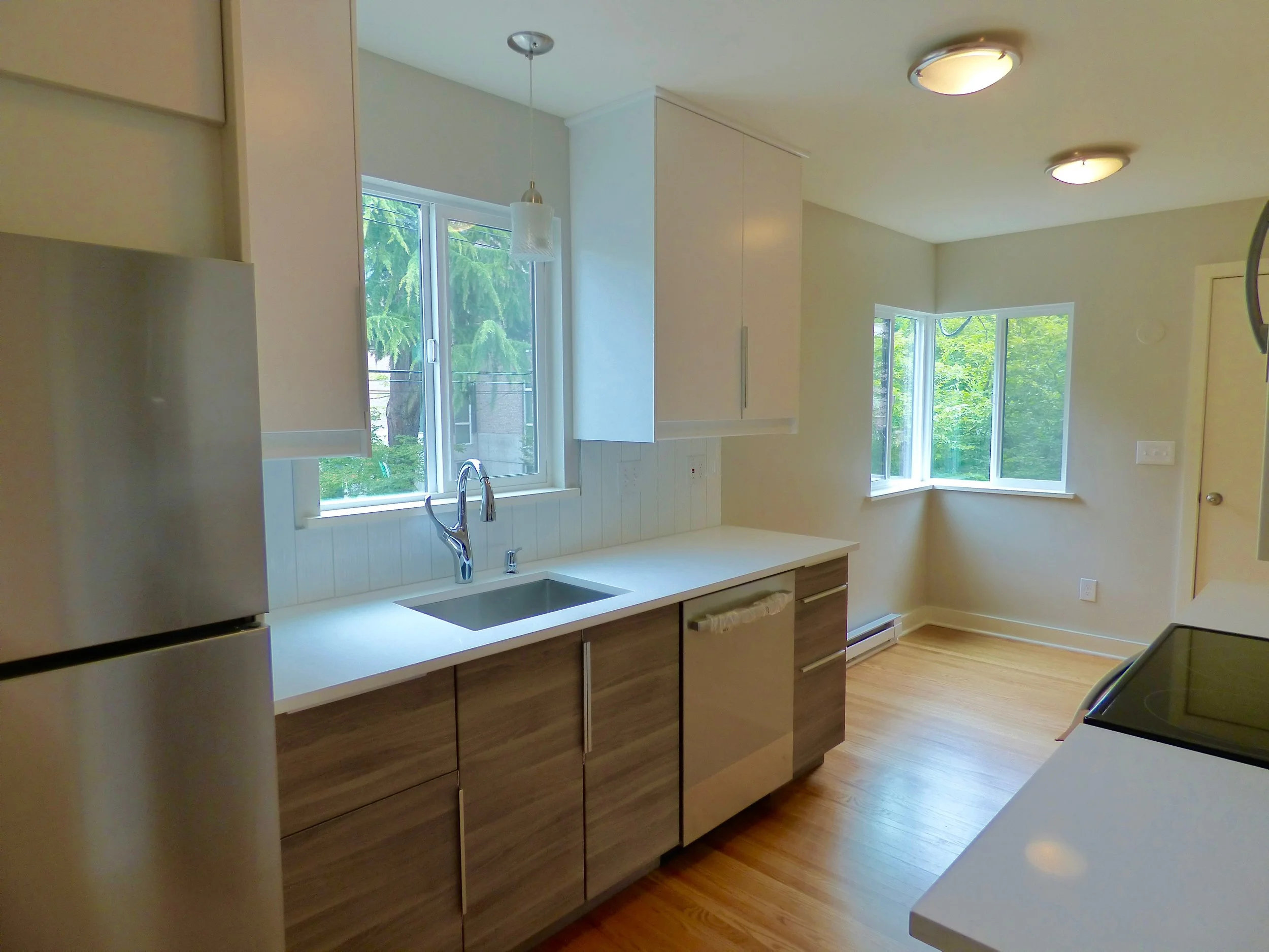 after pic capitol hill duplex kitchen east.jpg