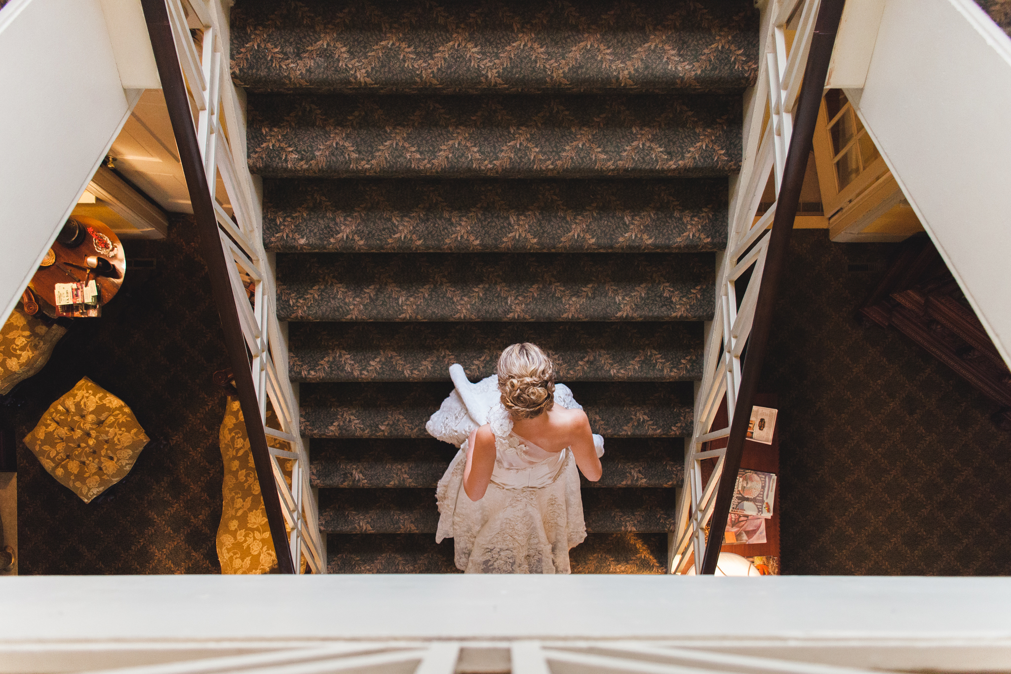 Bride walking up stairs at Old Silk Mill wedding in Fredericksburg Virginia