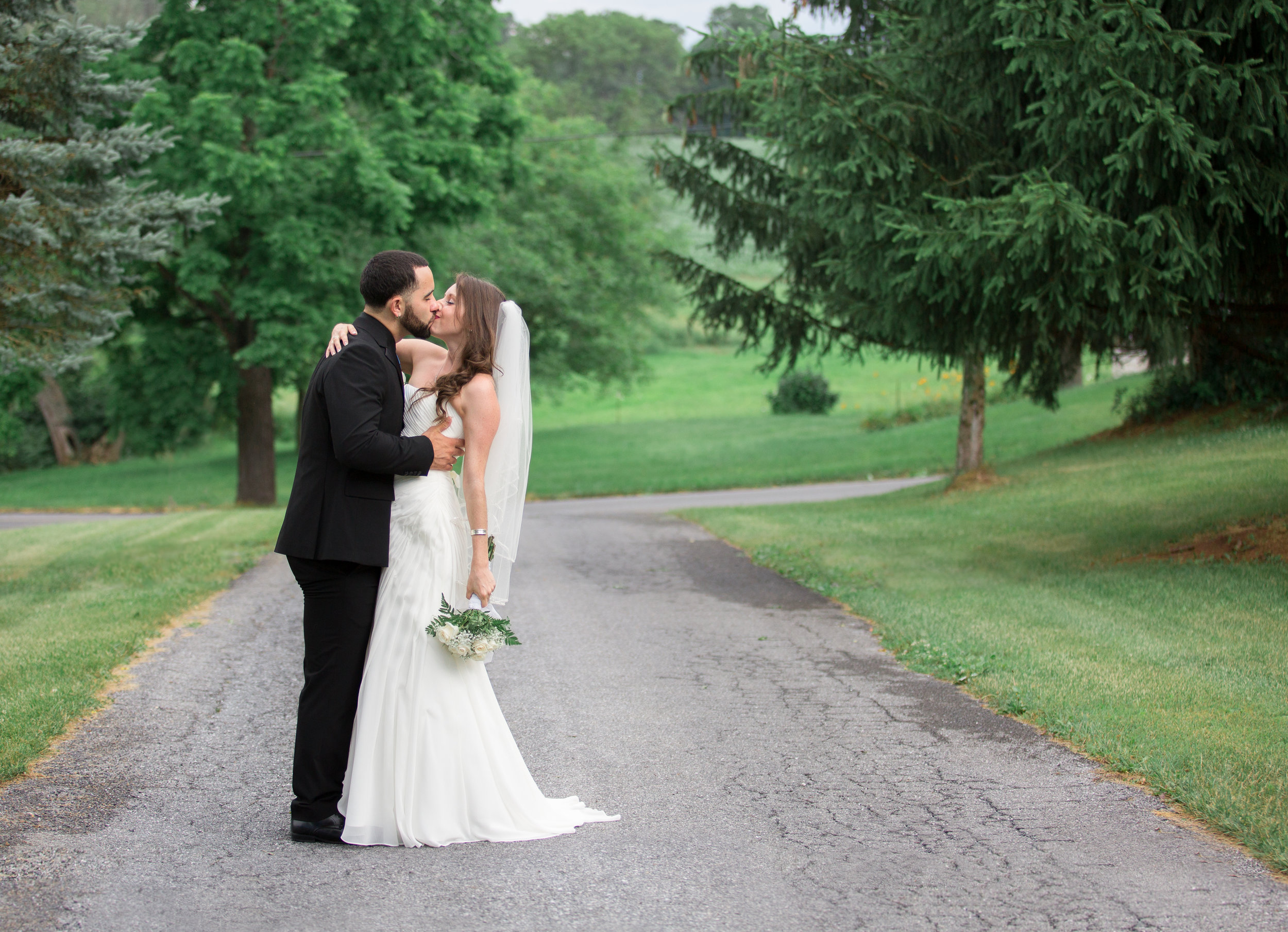 Bride and groom in driveway at Berry Patch Bed Breakfast in Lebanon Pennsylvania