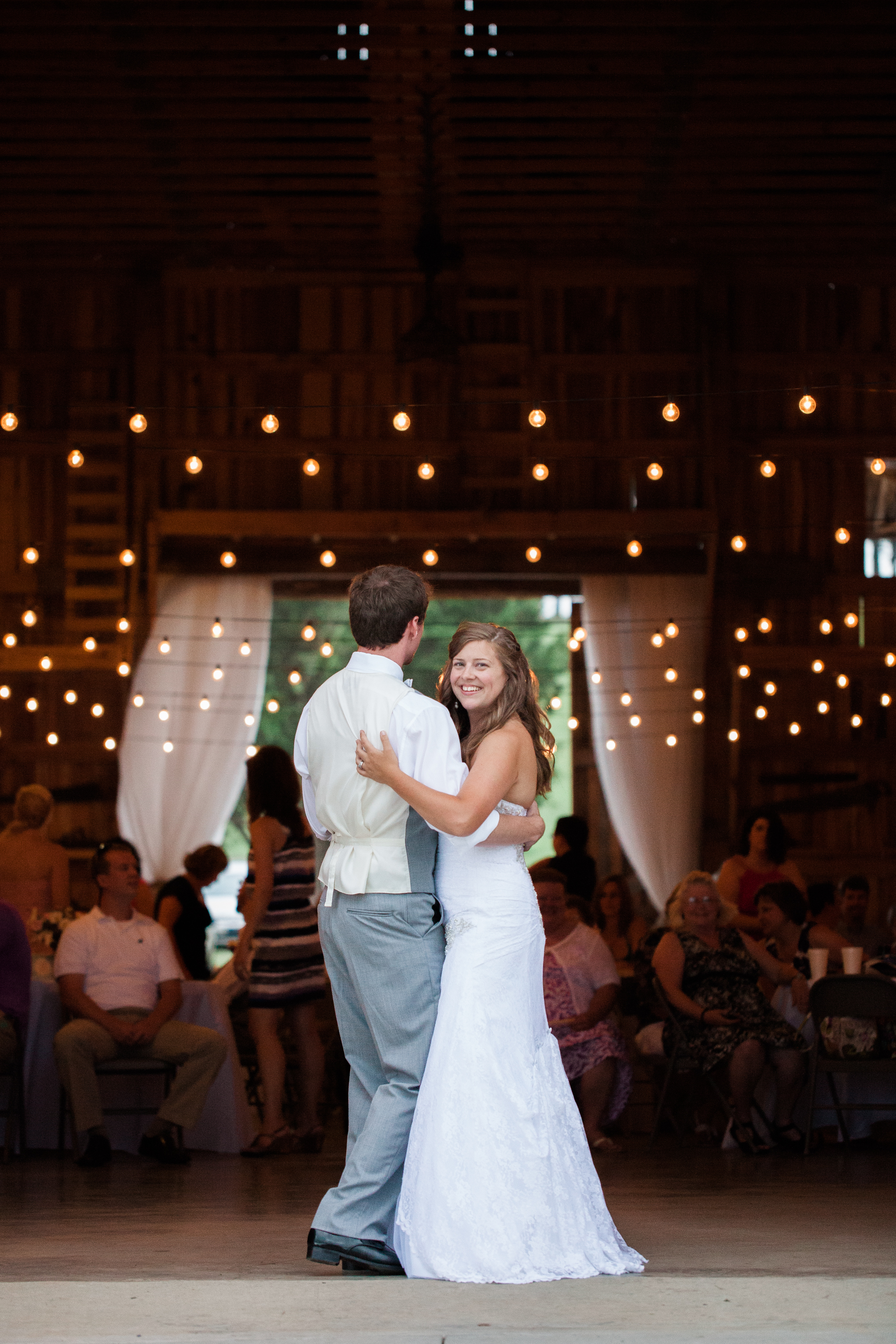 Bride and groom dance at Harvest Acres Farm Tennessee wedding